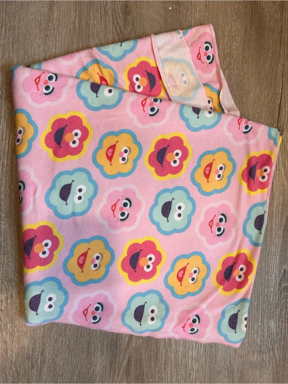 Copper Pearl/ Sesame Street swaddle Blanket with Colorful Character Face Flowers